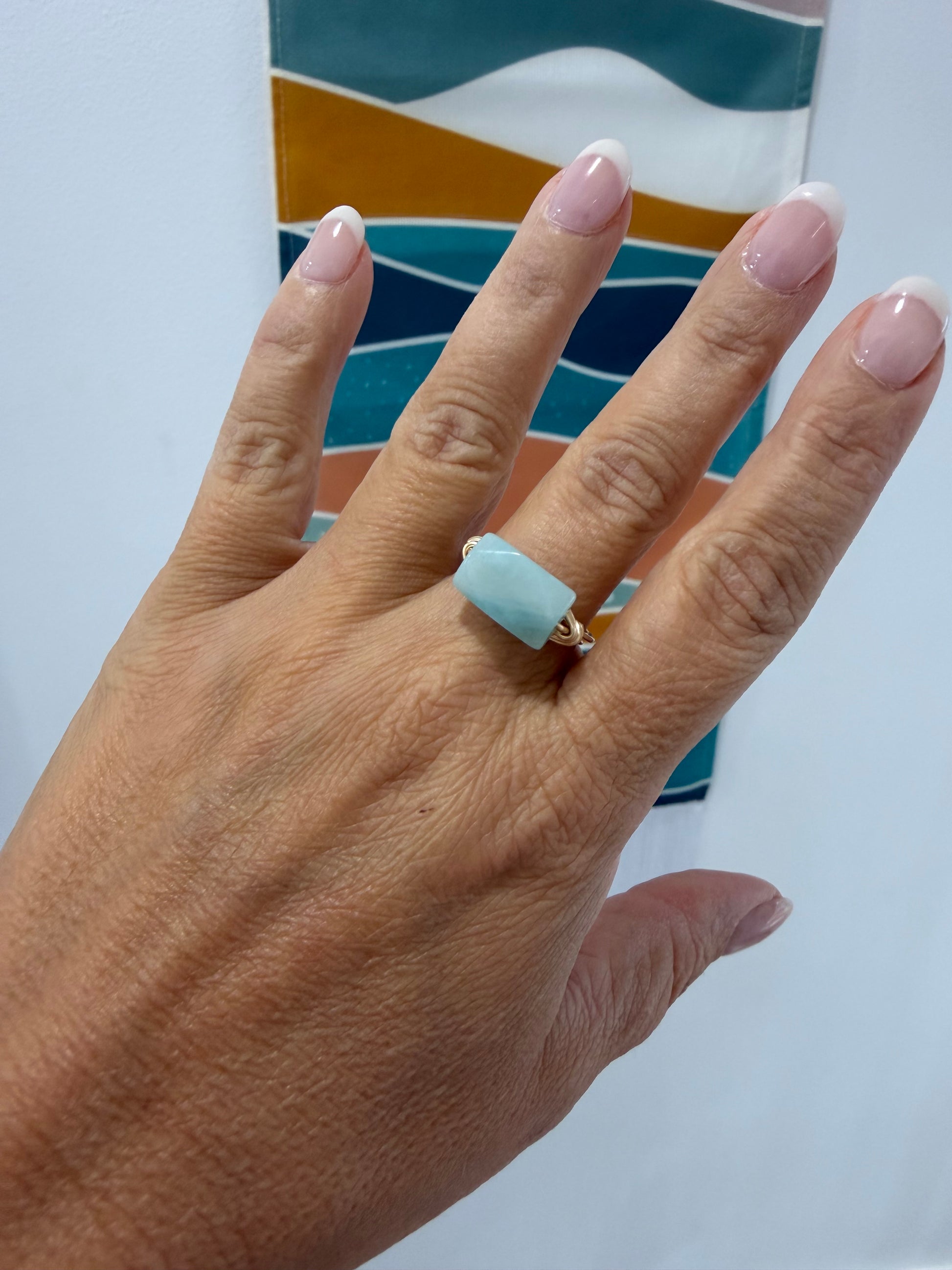 Amazonite gemstone ring with 14k gold-filled setting worn on the hand