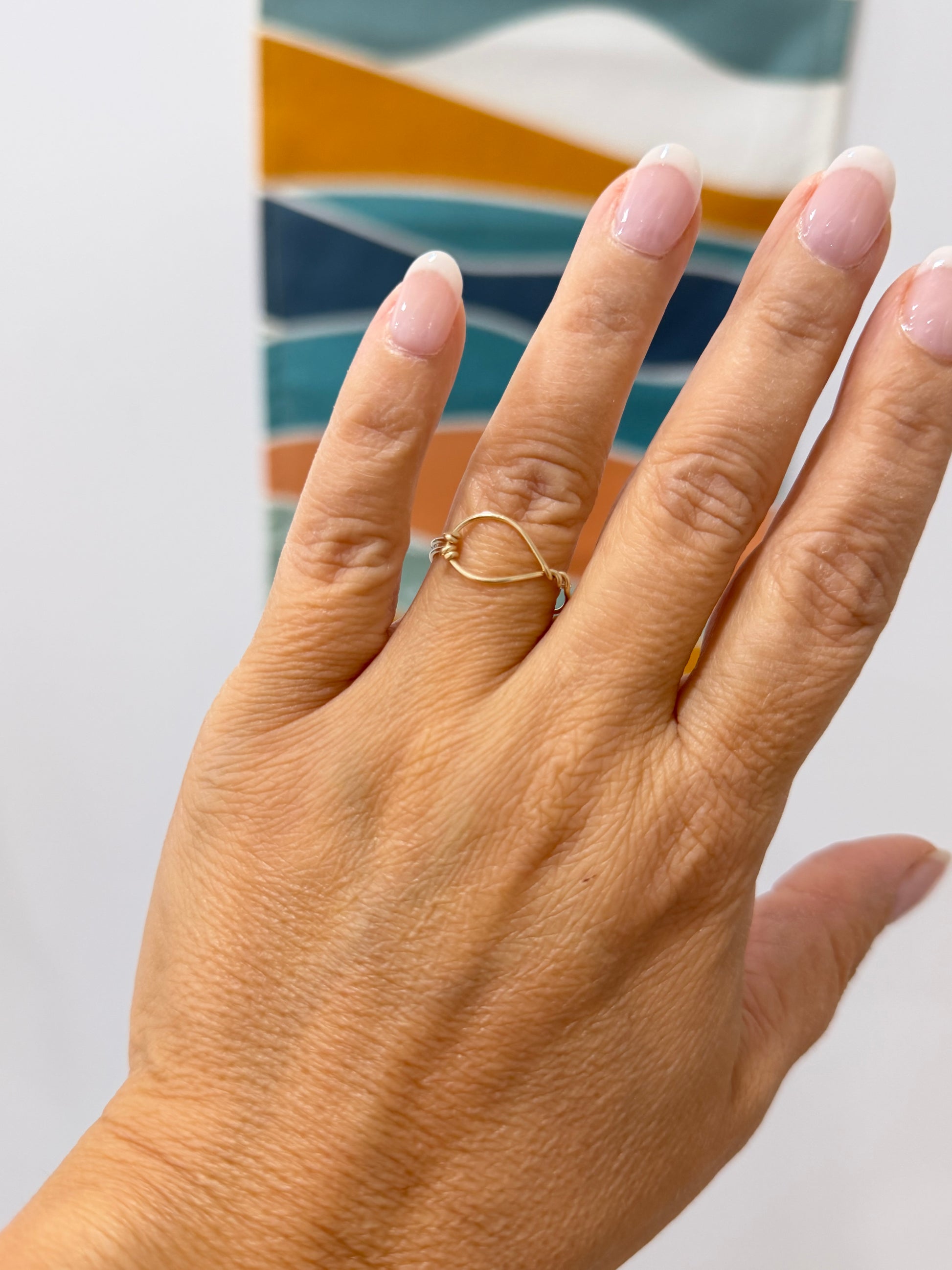 Side view of Eye of the Sea ring handcrafted from 14k gold-filled wire