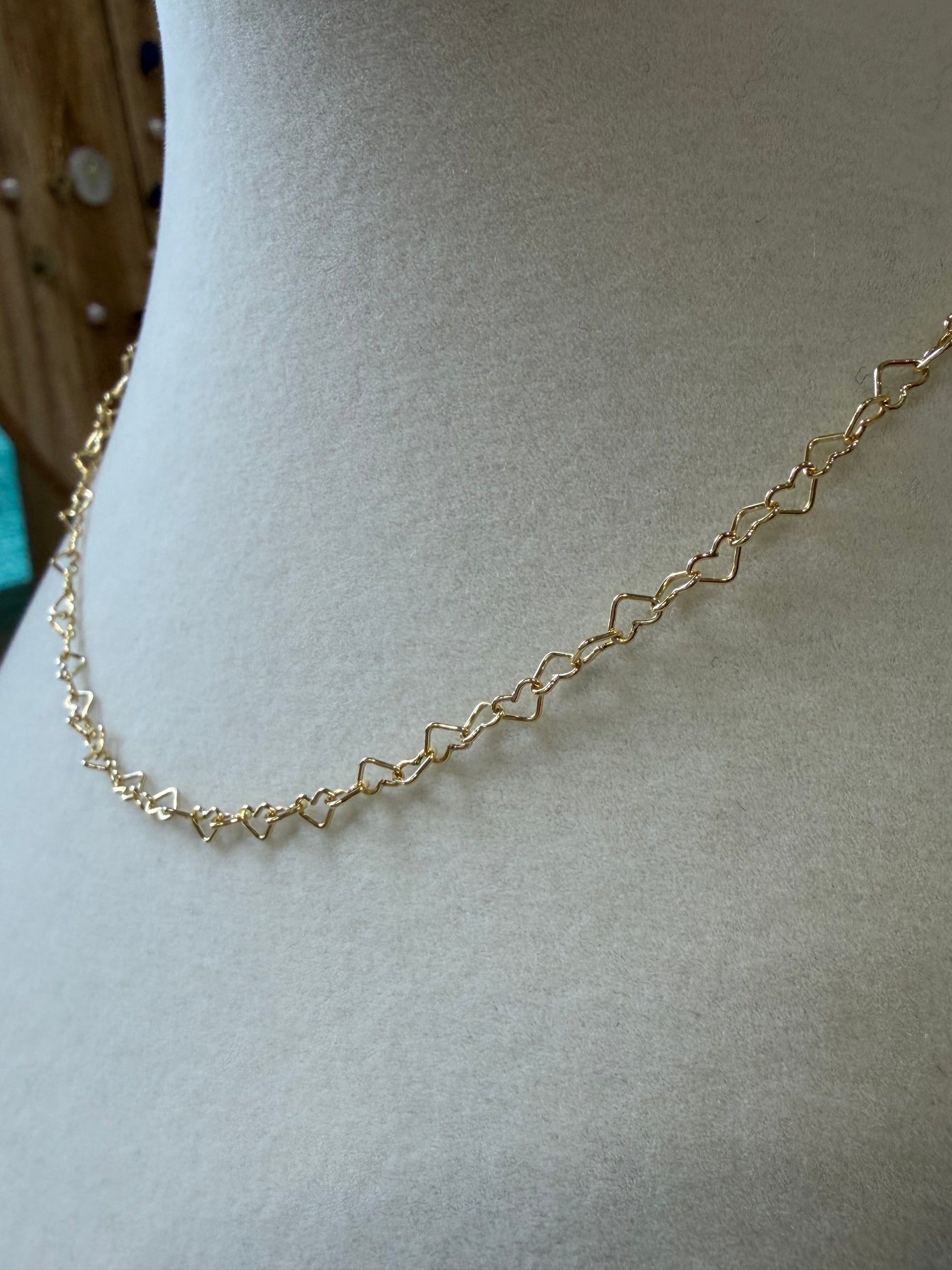 14k gold-filled heart necklace styled alone for a delicate, minimalist look