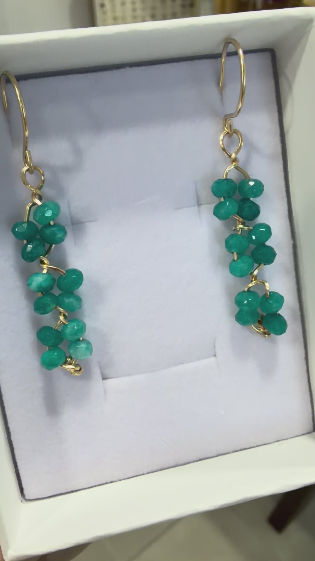 Short video showing amazonite gemstone earrings made with 14k gold-filled wire, featured in a permanent jewelry collection in Destin, FL