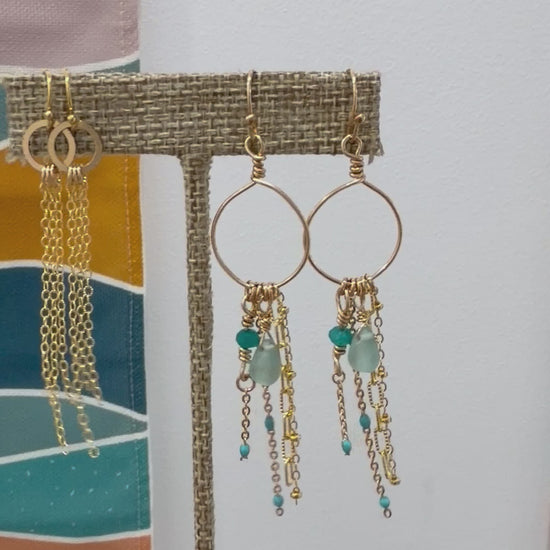 Video showing Whispering Waves earrings made with 14k gold-filled wire and gemstone accents gently moving