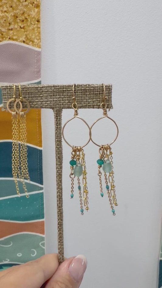 Video showing Whispering Waves earrings made with 14k gold-filled wire and gemstone accents gently moving