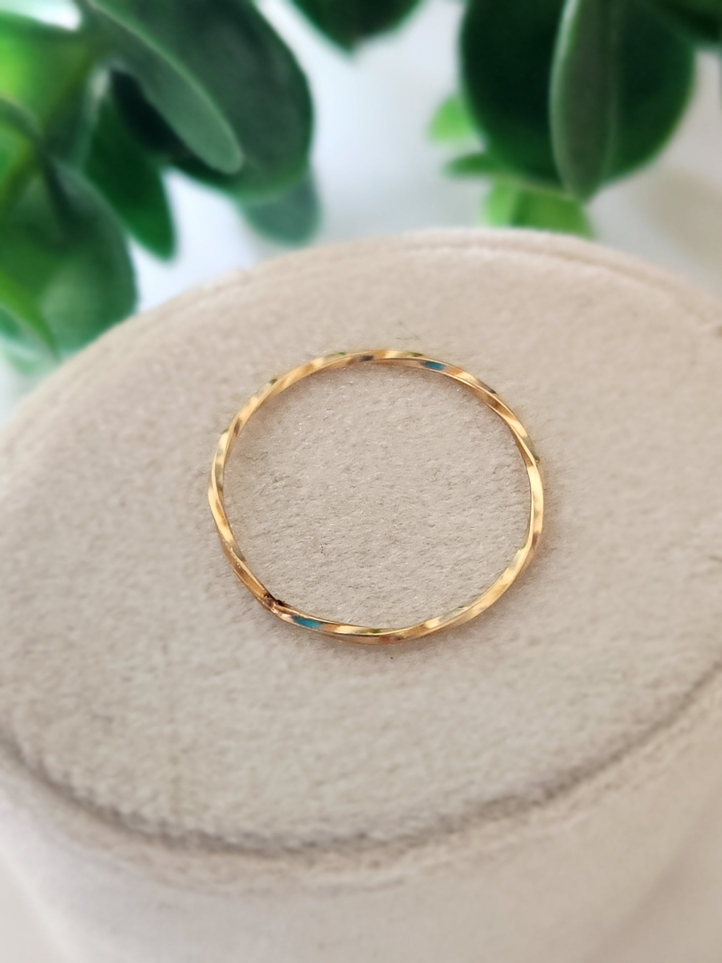 Single 14k gold-filled tide stacking ring with hammered wave-like texture
